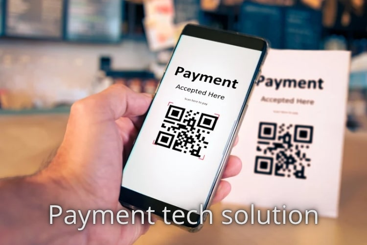 small business owner using payment tech with smartphone and card reader